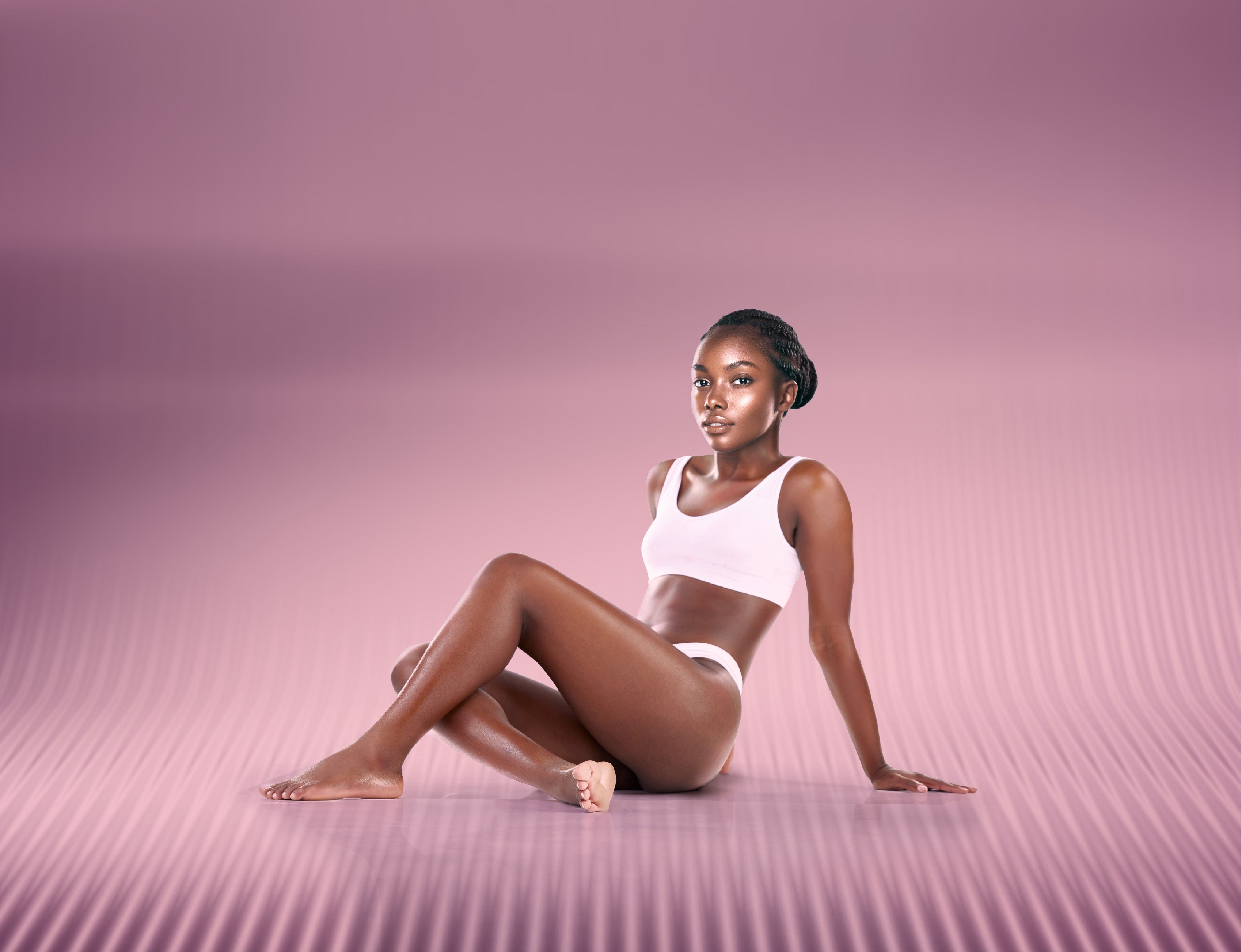 Woman enjoying full body laser hair removal with Epilaser